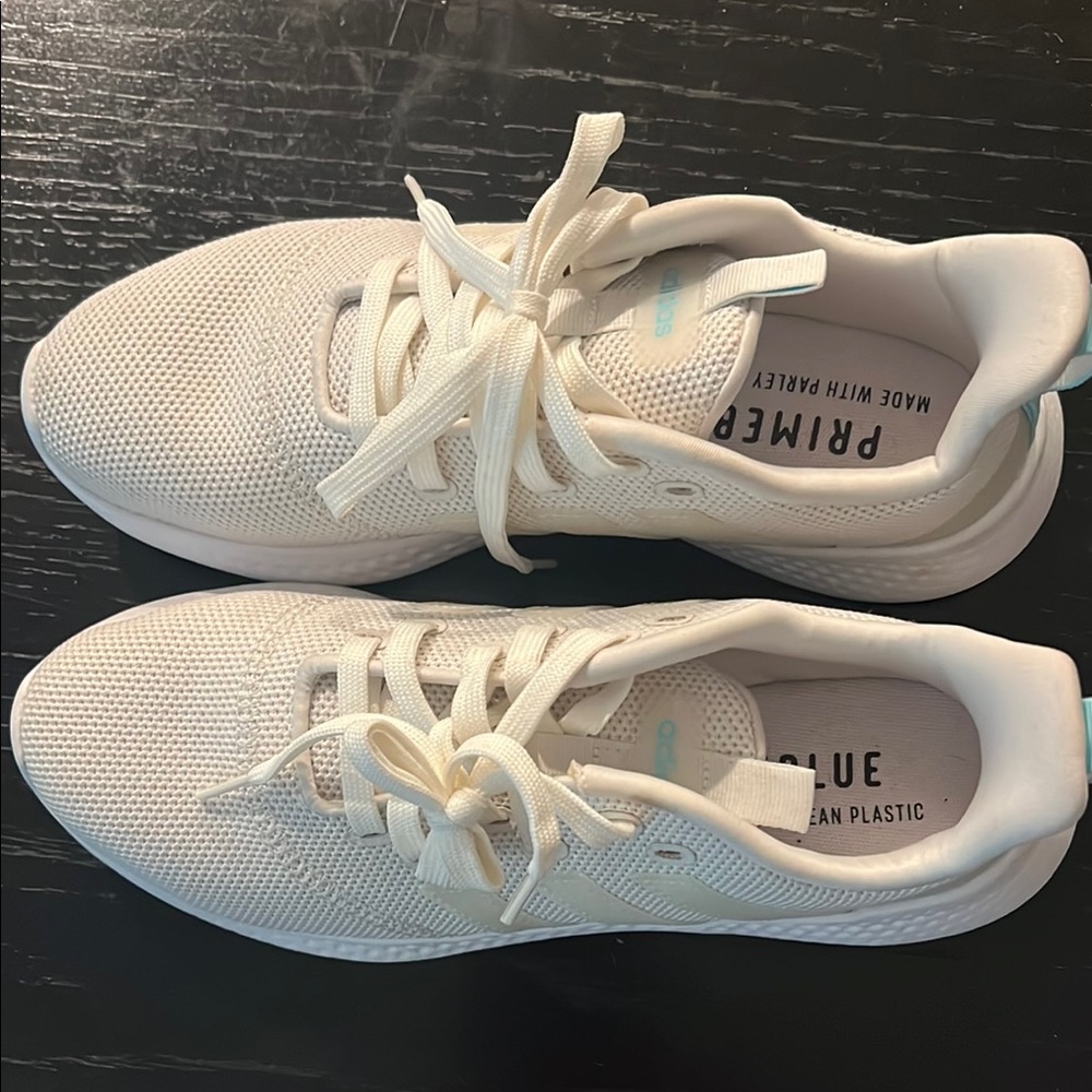 Adidas Cream and Blue Sneakers Sleek Design